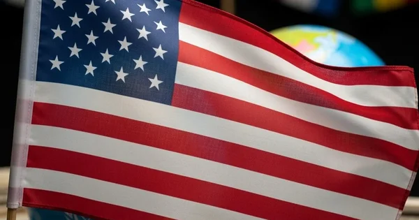 The U.S. flag stands among other nations' flags and symbols of government.