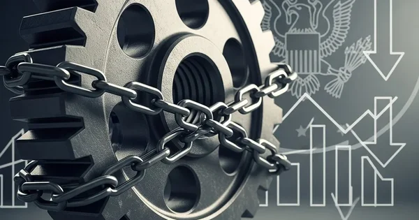 A gear is wrapped in chains against a backdrop of a graph trending downward with the US emblem.