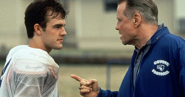 Jon Voight (right) portrays Coach Bud Kilmer as he confronts quarterback Mox, played by James Van Der Beek, in a scene from the film "Varsity Blues."