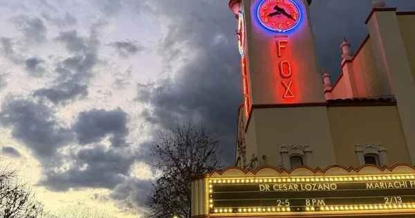 The Fox Theater marquee advertises 'Dr. Cesar Lozano' and 'Mariachi Fest'.