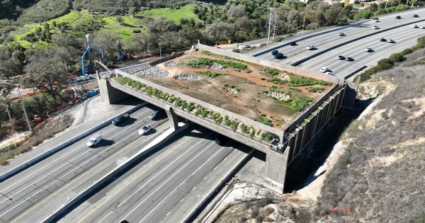 Construction continues on the Wallis Annenberg Wildlife Crossing spanning the 101 freeway in Agoura Hills, California.